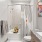bathroom with sink mirror and large shower