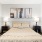 bedroom with bed and wall art