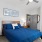 bedroom with bed side table and doorways