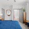 bedroom with bed and mirror