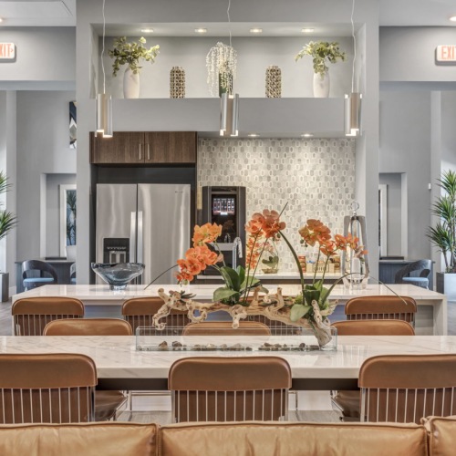 Exclusive access to resident-only features clubhouse with kitchen and large windows