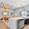 kitchen with island and view of a living room