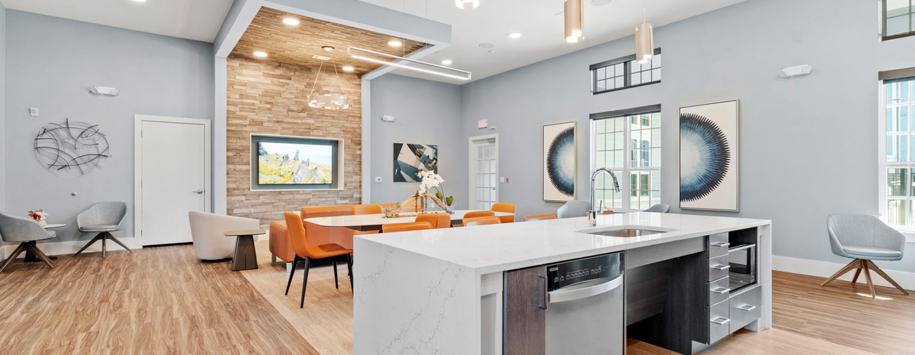 kitchen with island and view of a living room