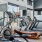 workout equipment in room with mirrors and a tv