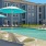 pool with a building behind it 