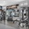 fitness center showing plenty of equipment and modern decor in a large, spacious room