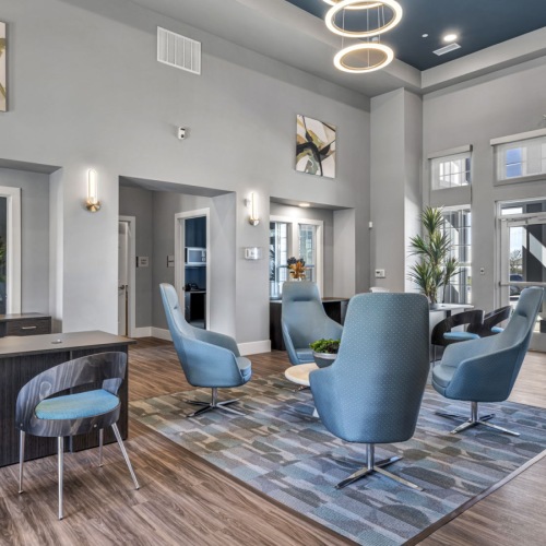 Find your perfect fit at Haven at Treeline spacious lounge area with high ceilings, bright lighting and ample seating